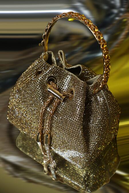 Be Chic_Gold Crystals, Tassels Embellished Potli _at_Aza_Fashions