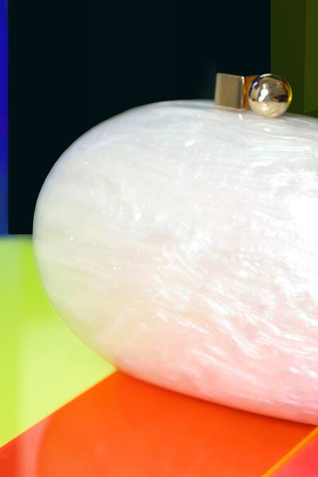 Be Chic_Ivory Metal Clasp Oval Clutch _Online_at_Aza_Fashions