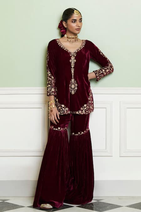 Devnaagri Wine Velvet, Silk Embroidery, Sequins, Zari Split Zardozi Kurta Gharara Set Online at Aza Fashions Devnaagri_Wine Velvet, Silk Embroidery, Sequins, Zari Split Zardozi Kurta Gharara Set _Online_at_Aza_Fashions