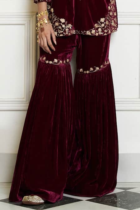 Buy Devnaagri Wine Velvet, Silk Embroidery, Sequins, Zari Split Zardozi Kurta Gharara Set Online at Aza Fashions Buy_Devnaagri_Wine Velvet, Silk Embroidery, Sequins, Zari Split Zardozi Kurta Gharara Set _Online_at_Aza_Fashions