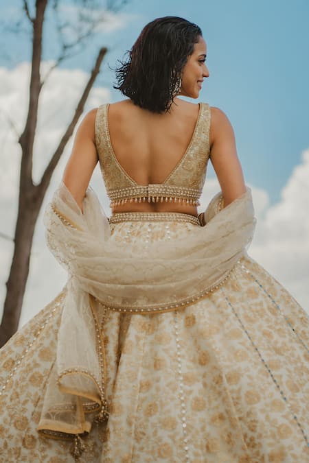 Shop_Cedar & Pine_Gold Tulle Tassels, Lace, Sequins, Pearls Floral Vine Embroidered Lehenga Set _at_Aza_Fashions