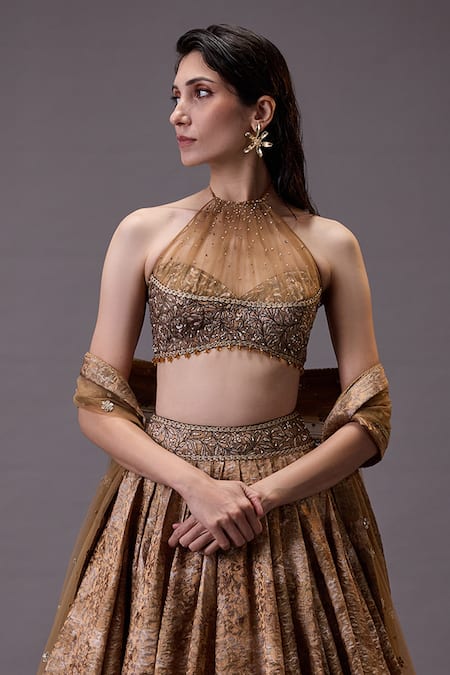 Shop Cedar & Pine Gold Tulle, Brocade Embroidery Halter Neck Floral Thread Lehenga Set Online at Aza Fashions Shop_Cedar & Pine_Gold Tulle, Brocade Embroidery Halter Neck Floral Thread Lehenga Set _Online_at_Aza_Fashions