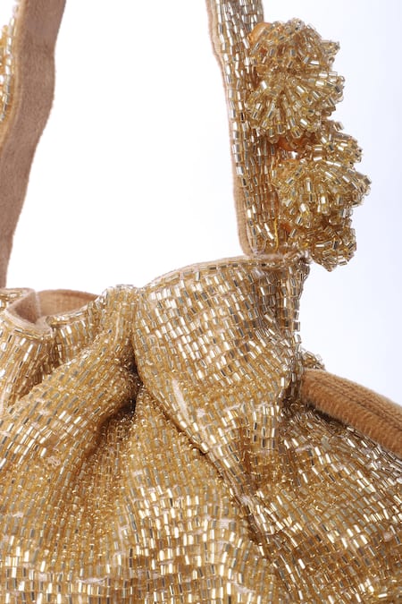 Buy_Tasna_Gold Cut Work, Pearls, Tassels Cutdana Potli Bag 