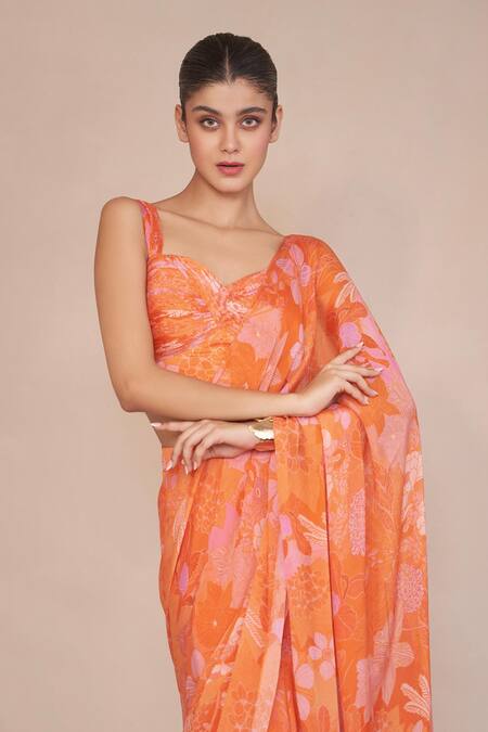 Ankita Dharman_Orange Muslin, Chiffon Sweetheart Neck Floral Printed Pre-draped Ruffle Saree_Online_at_Aza_Fashions