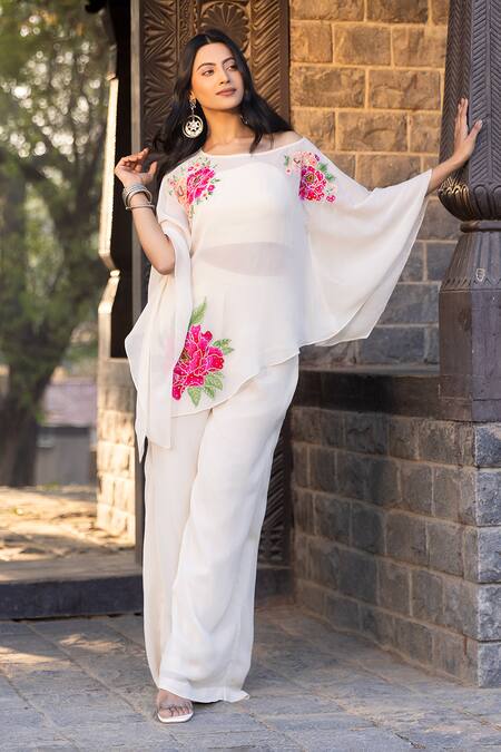 Shop Kahani Lush Cream Georgette Cut Work, Embroidery, Sequins Asymmetric Floral Top And Pant Set Online at Aza Fashions Shop_Kahani Lush_Cream Georgette Cut Work, Embroidery, Sequins Asymmetric Floral Top And Pant Set _Online_at_Aza_Fashions
