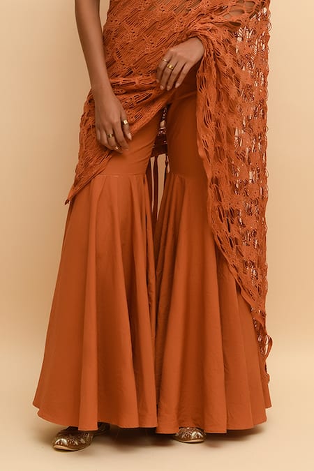 R. Y By Rishi And Vibhuti Orange Cotton Halter Neck Mesh Pre-draped Pant Saree Set at Aza Fashions R. Y By Rishi And Vibhuti_Orange Cotton Halter Neck Mesh Pre-draped Pant Saree Set_at_Aza_Fashions