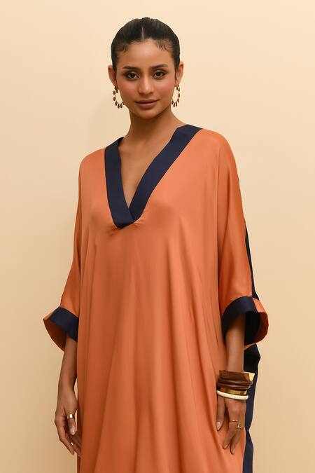 Buy R. Y By Rishi And Vibhuti Orange Modal, Silk V-neck Asymmetric Kurta Set With Contrast Border Online at Aza Fashions Buy_R. Y By Rishi And Vibhuti_Orange Modal, Silk V-neck Asymmetric Kurta Set With Contrast Border_Online_at_Aza_Fashions