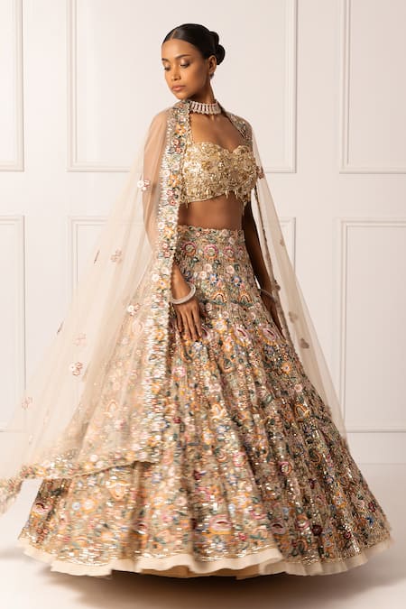 Isha Regalia_Beige Satin, Net Sequins, Beads Halter Neck, Floral Vine Embroidered Lehenga Set _at_Aza_Fashions