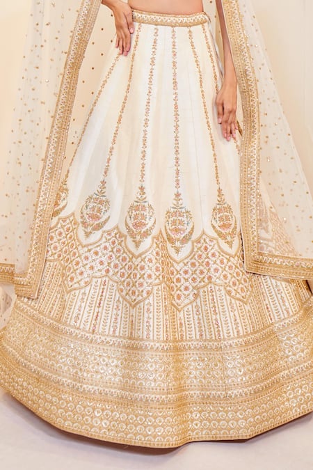 Buy Pallavi Poddar Ivory Silk Embroidery, Zari, Sequins Plunge Neck Phool Vine Lehenga Set Online at Aza Fashions Buy_Pallavi Poddar_Ivory Silk Embroidery, Zari, Sequins Plunge Neck Phool Vine Lehenga Set _Online_at_Aza_Fashions