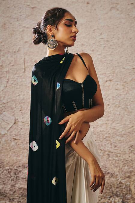 Masumi Mewawalla_White Embroidery, Sequins Sweetheart Neck Black Corset Blouse And Skirt Set _at_Aza_Fashions