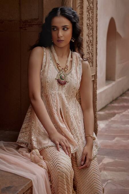 Mustard Moon By Neyha And Vrinda_Peach Cotton, Georgette, Net Pearls, Sequins V-neck Asymmetric Peplum Tunic Set_Online_at_Aza_Fashions