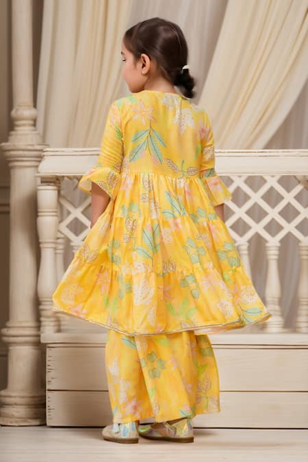 Shop Petite Pomme Yellow Muslin, Net Tassels, Lace, Floral Printed Angarkha And Sharara Set at Aza Fashions Shop_Petite Pomme_Yellow Muslin, Net Tassels, Lace, Floral Printed Angarkha And Sharara Set _at_Aza_Fashions