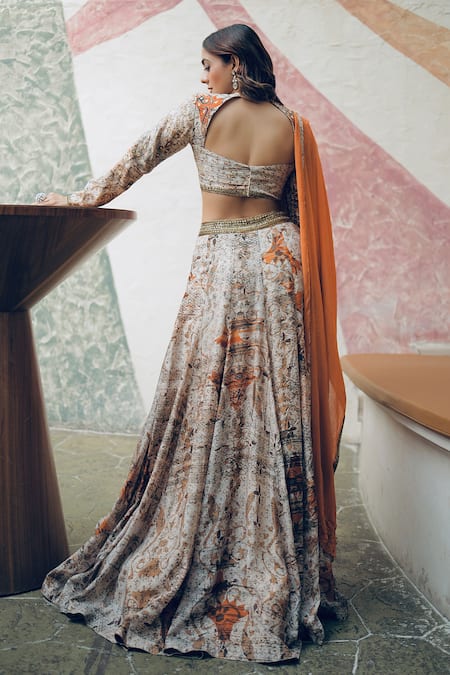Shop Koswi Brown Viscose Sequins, Zari V-neck Abstract Floral Print Lehenga Set at Aza Fashions Shop_Koswi_Brown Viscose Sequins, Zari V-neck Abstract Floral Print Lehenga Set _at_Aza_Fashions