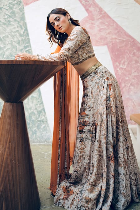 Shop Koswi Brown Viscose Sequins, Zari V-neck Abstract Floral Print Lehenga Set Online at Aza Fashions Shop_Koswi_Brown Viscose Sequins, Zari V-neck Abstract Floral Print Lehenga Set _Online_at_Aza_Fashions