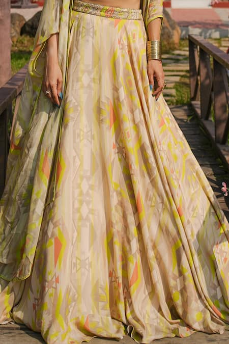 Shop Koswi Green Viscose Zari, Beads, Gota Patti Plunge Geometric Print Cape And Lehenga Set Online at Aza Fashions Shop_Koswi_Green Viscose Zari, Beads, Gota Patti Plunge Geometric Print Cape And Lehenga Set _Online_at_Aza_Fashions