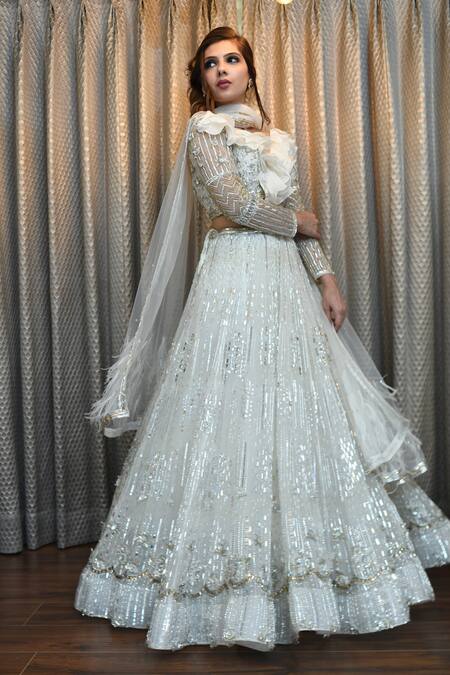 Shop_Ronak And Shruti_Ivory Net Feathers, Embroidery, Crystals, Sequins, Stones V-neck Lehenga Set _Online_at_Aza_Fashions