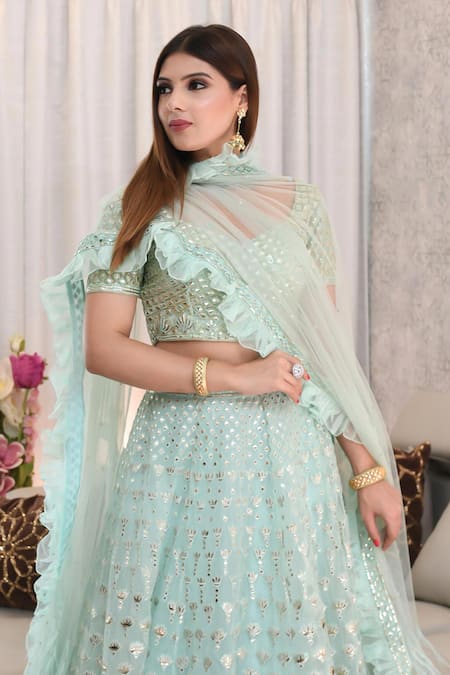Ronak And Shruti_Blue Organza, Net Embroidery, Cut Work, Foil Printing, Mint Lotus Lehenga Set _at_Aza_Fashions