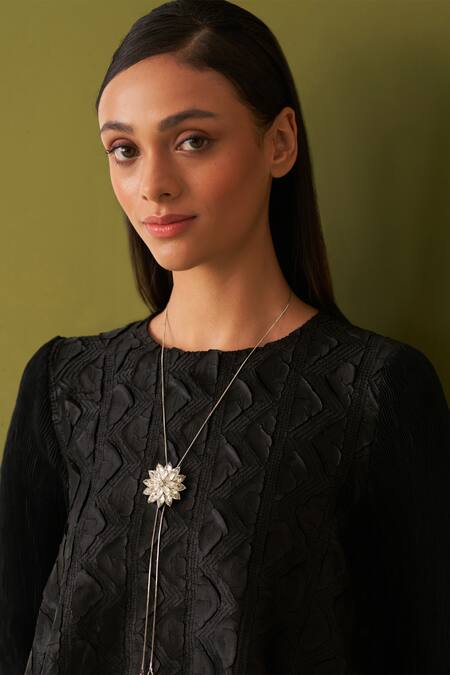 Pleats By Aruni Black Crepe, Satin Round Neck Textured Top And Skirt Set at Aza Fashions Pleats By Aruni_Black Crepe, Satin Round Neck Textured Top And Skirt Set _at_Aza_Fashions