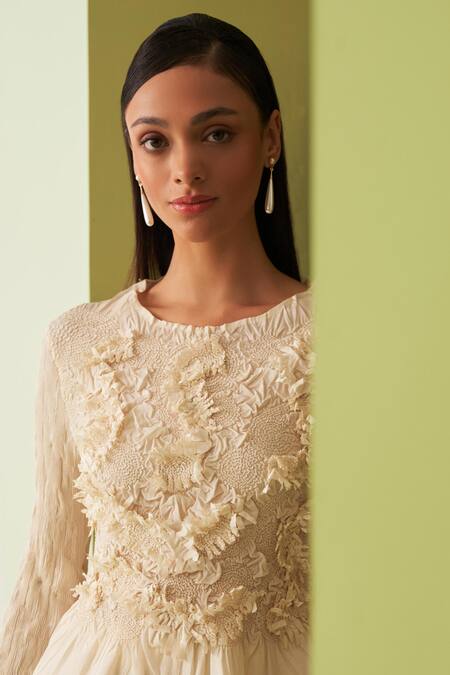 Pleats By Aruni_Ivory Crepe Round Neck Textured Top And Skirt Set _Online_at_Aza_Fashions