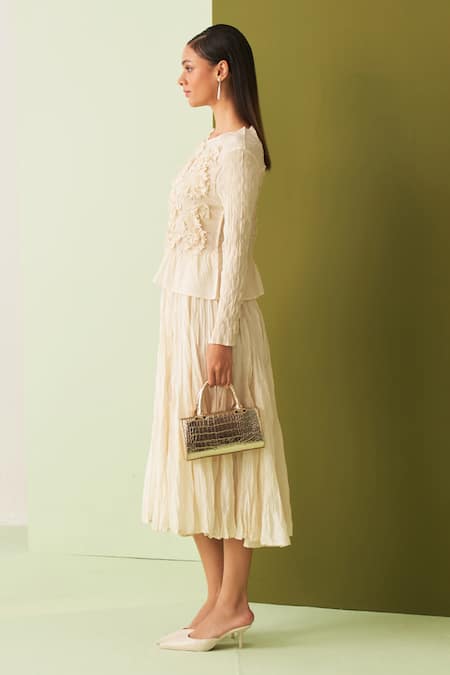 Pleats By Aruni_Ivory Crepe Round Neck Textured Top And Skirt Set _at_Aza_Fashions