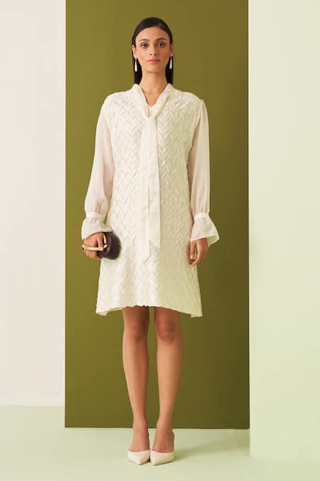 Shop Pleats By Aruni White Crepe, Satin Embroidery Open Neck Chevron Textured Tie-up Dress Online at Aza Fashions Shop_Pleats By Aruni_White Crepe, Satin Embroidery Open Neck Chevron Textured Tie-up Dress _Online_at_Aza_Fashions