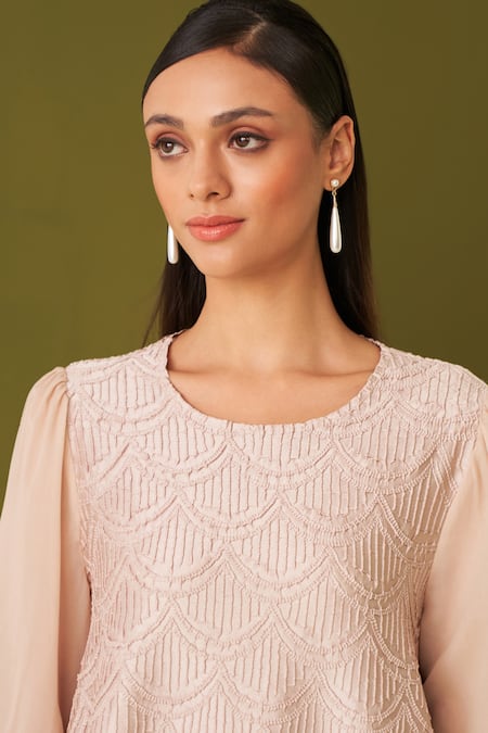 Pleats By Aruni Ivory Crepe Embroidery Round Neck Asymmetric Textured Top Online at Aza Fashions Pleats By Aruni_Ivory Crepe Embroidery Round Neck Asymmetric Textured Top _Online_at_Aza_Fashions