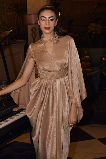 Shop_House Of Fett_Gold Linen Ruffles Keyhole Neck Rosette Applique Winged Sleeve Gown _Online_at_Aza_Fashions