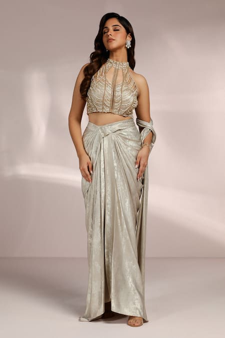 Shop Label Moni K Gold Net Cut Work Halter Neck Cutdana Tassel Embellished Blouse Online at Aza Fashions Shop_Label Moni K_Gold Net Cut Work Halter Neck Cutdana Tassel Embellished Blouse _Online_at_Aza_Fashions