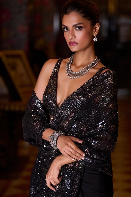 Shop_Seema Gujral_Black Georgette Sequins, Crystals Plunge Neck Metallic Embroidered Saree Set _Online_at_Aza_Fashions