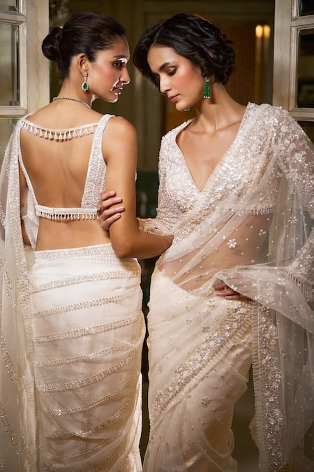 Shop_Seema Gujral_Ivory Net Sequins, Crystals V-neck Embroidered Floral Saree With Blouse _Online_at_Aza_Fashions