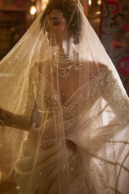 Seema Gujral Ivory Organza, Silk Gota Patti, Pearls Plunge Neck Embroidered Saree Set Online at Aza Fashions Seema Gujral_Ivory Organza, Silk Gota Patti, Pearls Plunge Neck Embroidered Saree Set _Online_at_Aza_Fashions