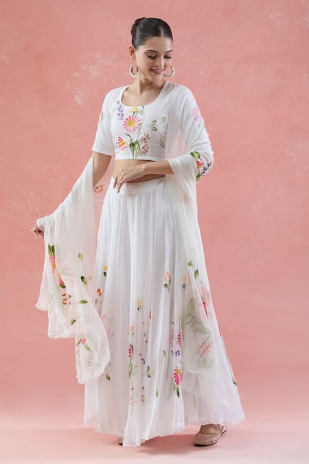 Naintara Bajaj White Chiffon Fabric Flowers Scoop Neck Floral Hand Painted Lehenga Set at Aza Fashions Naintara Bajaj_White Chiffon Fabric Flowers Scoop Neck Floral Hand Painted Lehenga Set _at_Aza_Fashions