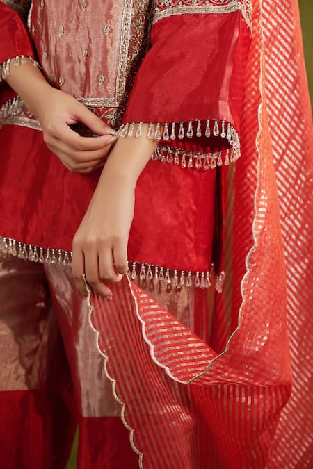 Shop Shalkii Red Tissue, Handloom Cotton, Chanderi Sequins, Zari, Zardozi Kurta Gharara Set Online at Aza Fashions Shop_Shalkii_Red Tissue, Handloom Cotton, Chanderi Sequins, Zari, Zardozi Kurta Gharara Set _Online_at_Aza_Fashions