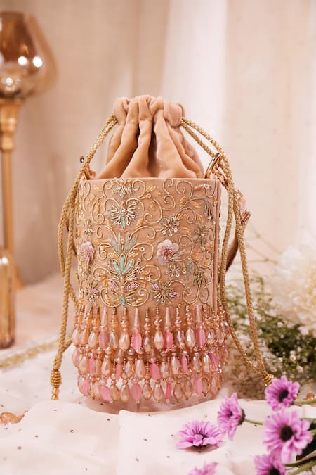 Shop House Of Vian Peach Cut Work, Embroidery, Sequins, Diamonds Embellished Velvet Potli Bag at Aza Fashions Shop_House Of Vian_Peach Cut Work, Embroidery, Sequins, Diamonds Embellished Velvet Potli Bag _at_Aza_Fashions