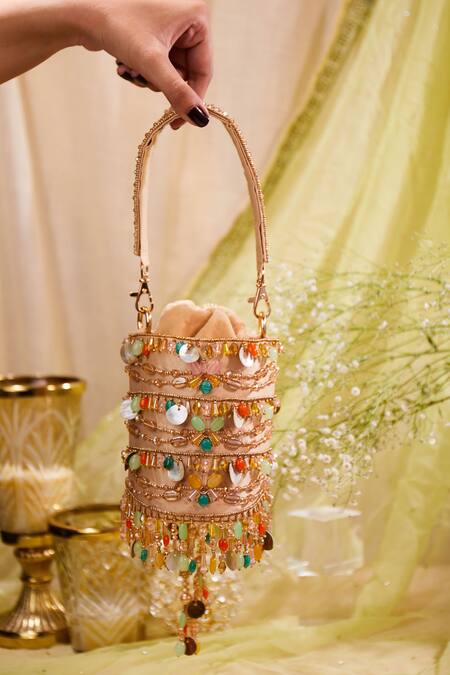 House Of Vian Multi Color Cut Work, Sequins, Zari Peach Velvet And Dabka Bucket Bag Online at Aza Fashions House Of Vian_Multi Color Cut Work, Sequins, Zari Peach Velvet And Dabka Bucket Bag _Online_at_Aza_Fashions