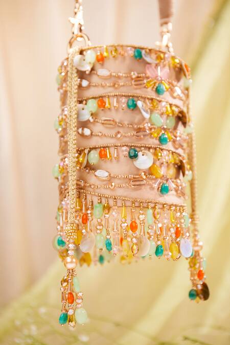 Buy House Of Vian Multi Color Cut Work, Sequins, Zari Peach Velvet And Dabka Bucket Bag Online at Aza Fashions Buy_House Of Vian_Multi Color Cut Work, Sequins, Zari Peach Velvet And Dabka Bucket Bag _Online_at_Aza_Fashions