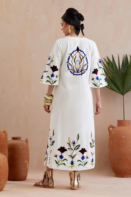 Shop Indian Summer Story Ivory Cotton Embroidery Round Neck Crest Midi Dress at Aza Fashions Shop_Indian Summer Story_Ivory Cotton Embroidery Round Neck Crest Midi Dress _at_Aza_Fashions