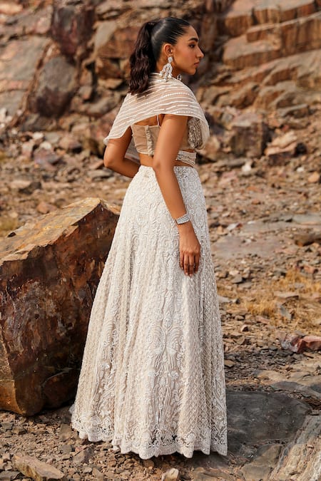 Shop Label Moni K Beige Silk Beads, Sequins, Cut Work Sweetheart Embroidered Bustier And Lehenga Set at Aza Fashions Shop_Label Moni K_Beige Silk Beads, Sequins, Cut Work Sweetheart Embroidered Bustier And Lehenga Set _at_Aza_Fashions