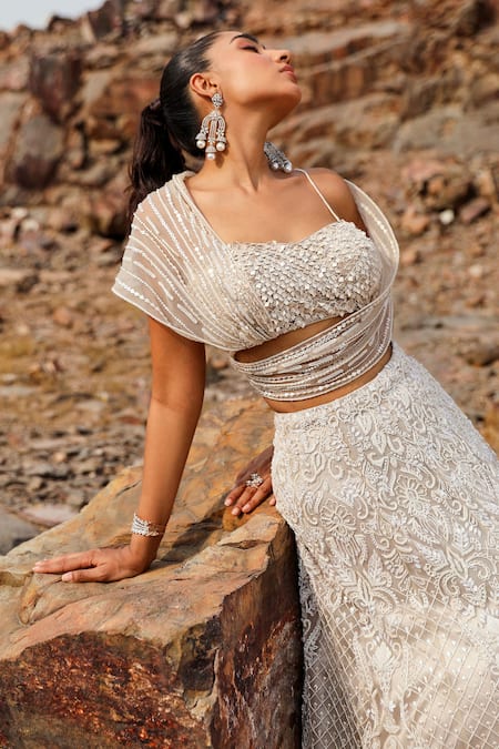 Buy Label Moni K Beige Silk Beads, Sequins, Cut Work Sweetheart Embroidered Bustier And Lehenga Set Online at Aza Fashions Buy_Label Moni K_Beige Silk Beads, Sequins, Cut Work Sweetheart Embroidered Bustier And Lehenga Set _Online_at_Aza_Fashions