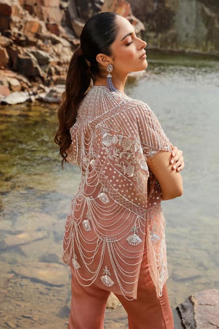 Buy Label Moni K Peach Organza Cut Work, Sequins, Embroidered Cape Blouse And Bell Bottom Pant Online at Aza Fashions Buy_Label Moni K_Peach Organza Cut Work, Sequins, Embroidered Cape Blouse And Bell Bottom Pant _Online_at_Aza_Fashions