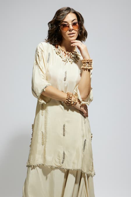 Sva By Sonam & Paras Modi_Ivory Silk Sequins, Beads Round Neck Embellished Tunic And Draped Skirt Set_at_Aza_Fashions