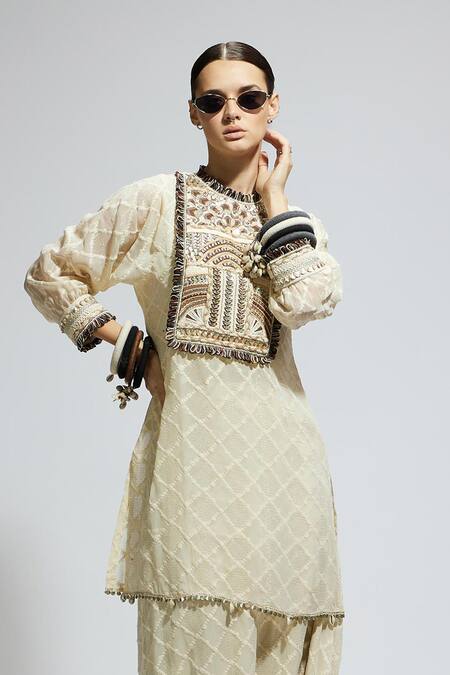 Sva By Sonam & Paras Modi Ivory Crepe Embroidery Round Neck Aztec Tunic And Skirt Set at Aza Fashions Sva By Sonam & Paras Modi_Ivory Crepe Embroidery Round Neck Aztec Tunic And Skirt Set_at_Aza_Fashions