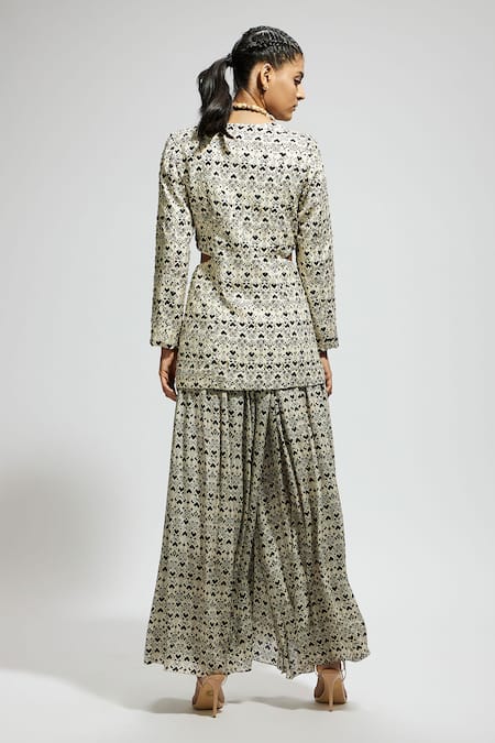 Shop Sva By Sonam & Paras Modi White Crepe Sequins, Beads V-neck Geometric Print Jacket And Flared Pant Set at Aza Fashions Shop_Sva By Sonam & Paras Modi_White Crepe Sequins, Beads V-neck Geometric Print Jacket And Flared Pant Set_at_Aza_Fashions