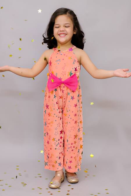 Lil Drama Pink Velvet, Polyester, Cotton Bows Shimmer Star Print Jumpsuit Online at Aza Fashions Lil Drama_Pink Velvet, Polyester, Cotton Bows Shimmer Star Print Jumpsuit _Online_at_Aza_Fashions