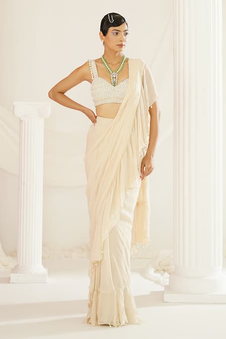 Buy Kapda Dori Ivory Georgette, Silk, Satin Pearls, Sequins Pre-draped Ruffle Saree Set Online at Aza Fashions Buy_Kapda Dori_Ivory Georgette, Silk, Satin Pearls, Sequins Pre-draped Ruffle Saree Set _Online_at_Aza_Fashions