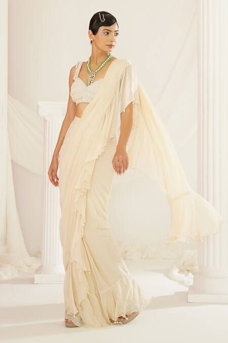 Kapda Dori Ivory Georgette, Silk, Satin Pearls, Sequins Pre-draped Ruffle Saree Set at Aza Fashions Kapda Dori_Ivory Georgette, Silk, Satin Pearls, Sequins Pre-draped Ruffle Saree Set _at_Aza_Fashions
