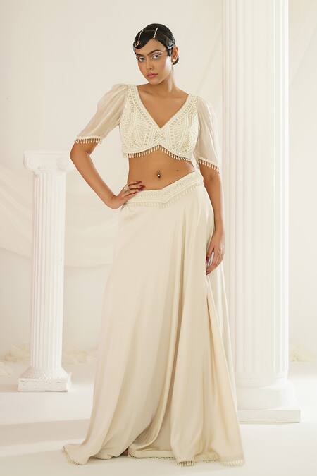 Buy Kapda Dori Ivory Silk, Satin, Organza Pearls, Sequins, Embroidery V-neck Lehenga Set Online at Aza Fashions Buy_Kapda Dori_Ivory Silk, Satin, Organza Pearls, Sequins, Embroidery V-neck Lehenga Set _Online_at_Aza_Fashions