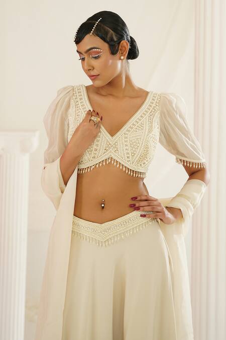 Buy Kapda Dori Ivory Silk, Satin, Organza Pearls, Sequins, Embroidery V-neck Lehenga Set Buy_Kapda Dori_Ivory Silk, Satin, Organza Pearls, Sequins, Embroidery V-neck Lehenga Set