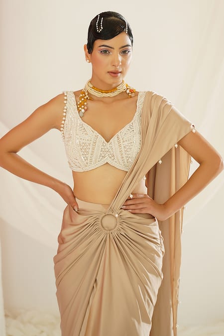 Kapda Dori Ivory Satin, Net, Silk Pearls, Gold Pre-draped Saree And Embroidered Blouse at Aza Fashions Kapda Dori_Ivory Satin, Net, Silk Pearls, Gold Pre-draped Saree And Embroidered Blouse _at_Aza_Fashions