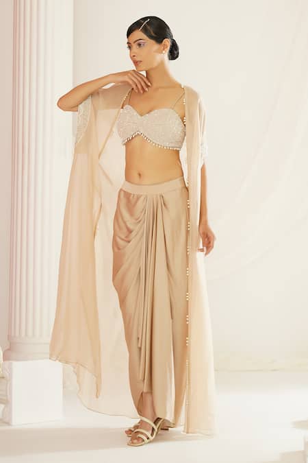 Kapda Dori Beige Satin Cut Work, Pearls, Sequins Sweetheart Hand Embroidered Cape Dhoti Set at Aza Fashions Kapda Dori_Beige Satin Cut Work, Pearls, Sequins Sweetheart Hand Embroidered Cape Dhoti Set _at_Aza_Fashions
